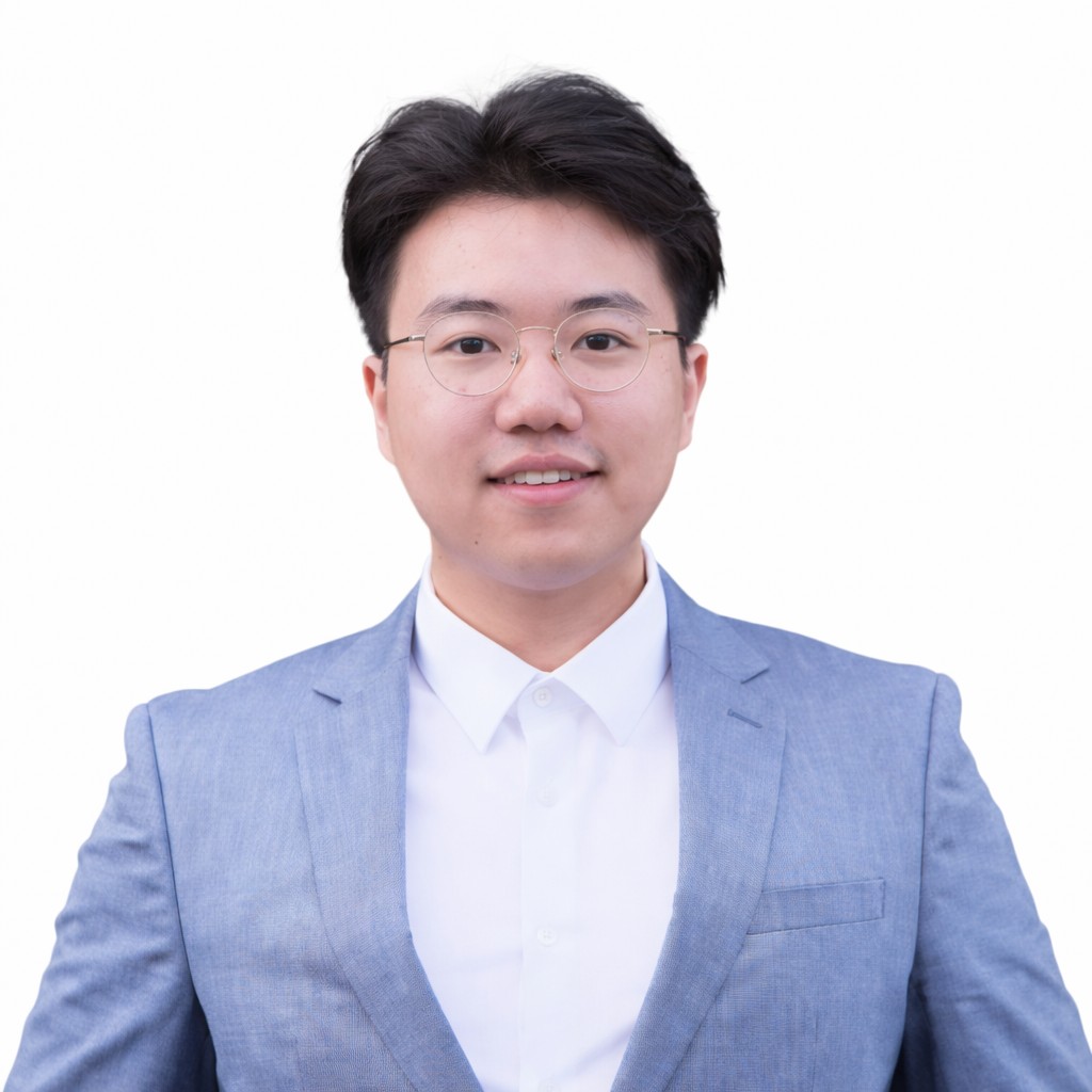 Portrait of Haodi Hu in a light blue blazer and white shirt.